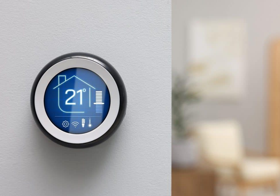 Smart Thermostat displaying temperature in Celsius scale and different icons